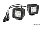 Pair of 3 inch black LED cube lights with four-optic grids, finned housings and sealed pigtail connectors
