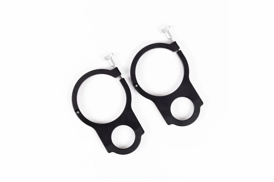 Pair of black aluminum RollpaX clamp mounts with silver T-knobs, viewed from above on white