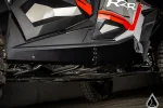 Rock sliders for the Polaris RZR XP 4 1000 shown installed on the machine, additional view