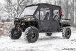 Soft cab enclosure doors for the Can-Am Defender MAX HD8, further view of the four black fabric doors on the machine