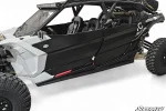 Black rock slider fitted along the rocker of a white four-seat Can-Am Maverick X3 MAX