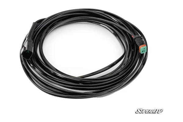 Coiled black extension wiring harness for LED cube lights with sealed two-pin connectors on both ends