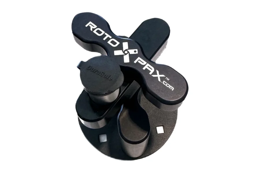 Assembled Gen 2 LOX locking pack mount with the DuraSafe dust cover capping the lock cylinder on the round base