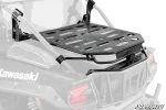 Black slotted cargo rack deck mounted behind the cab of a Kawasaki Teryx KRX with clamp brackets