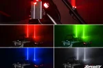 Laser whip beams shooting straight up from a UTV cage at night with red, green, blue and white options shown