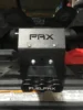 Front view of the PAX bar mount and FuelpaX handle installed on a roll bar in a UTV cargo bed