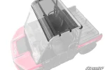 Light smoke tinted roof panel installed on the cage of a pink Polaris Ranger 150, viewed from above