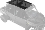 Dark tinted roof panels across the full four-seat cage of a Polaris RZR XP 4 1000, overhead view on a white background