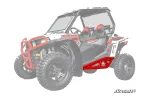 Red powder-coated tube rock sliders installed along the rocker of a Polaris RZR 900