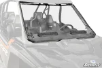 Full windshield on a Polaris RZR with two black vents low in the panel and black trim around the perimeter