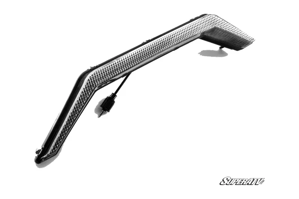 Molded LED accent light strip with a textured clear lens and pigtail lead, studio view