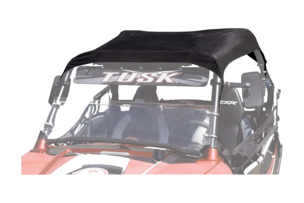 Black Tusk fabric roof stretched over the roll cage of an orange Polaris RZR, front corner view above a Tusk windshield