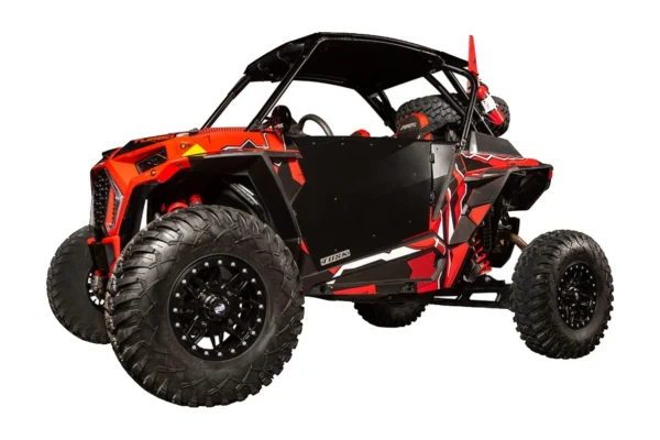 Black powder-coated Tusk Barrier doors installed on a red and black Polaris RZR, rear three-quarter view