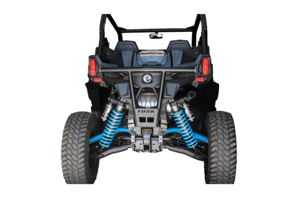 Tusk Impact black rear bumper installed on a Can-Am Maverick, rear straight-on view with blue coilovers