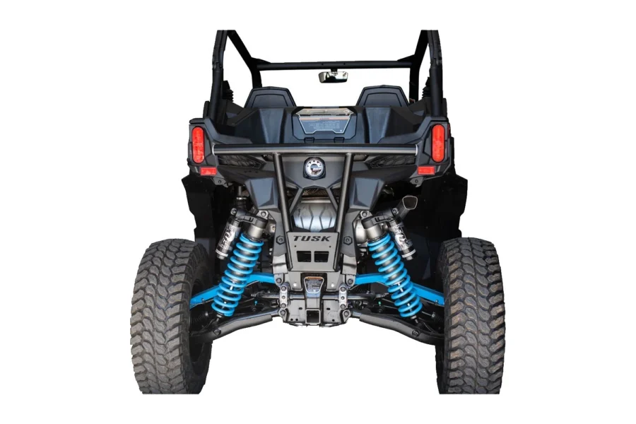 Tusk Impact black rear bumper installed on a Can-Am Maverick, rear straight-on view with blue coilovers