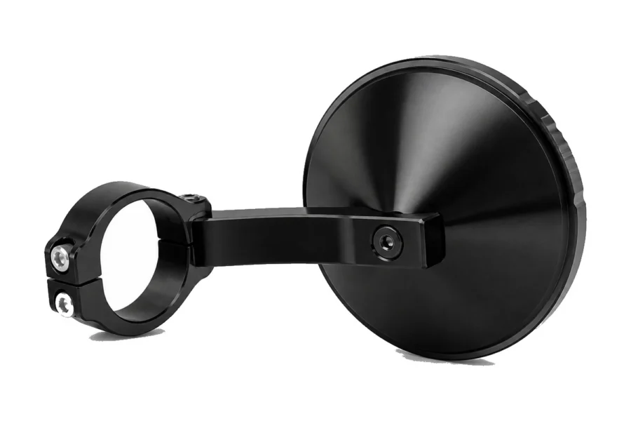 Tusk alloy round UTV mirror in black with its low profile roll cage clamp and arm, isolated