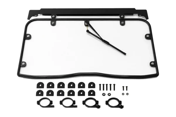 Tusk full view glass windshield with wiper and mounting hardware laid out on white
