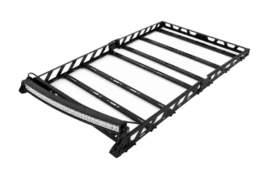 Tusk black steel UTV adventure roof rack with curved LED light bar at the front, angled view