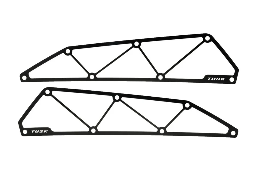 Pair of Tusk black aluminum intake covers isolated, laser-cut triangular frames with TUSK lettering
