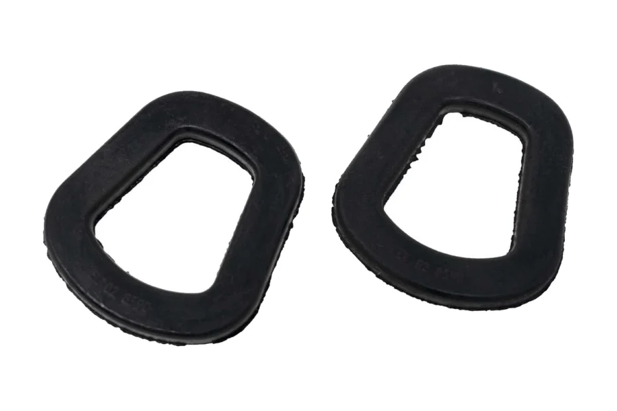 Two black rubber Wavian jerry can spout gaskets, isolated on white