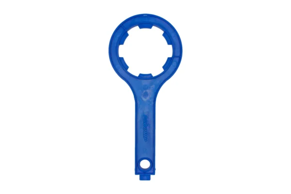 Blue plastic Wavian water can opener wrench with notched ring end, isolated on white