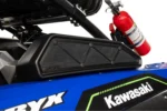 Tusk intake cover installed on a blue Kawasaki Teryx KRX with a mounted fire extinguisher nearby