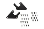 Two black mounting brackets and push-pin fasteners for the Tusk fender flare kit