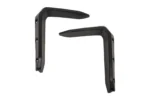 Pair of black molded Tusk front fender flares isolated on white