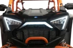 Front view of the Polaris RZR Pro with the white center accent light illuminated