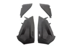 Four Tusk black door insert panels angled to show mounting brackets and Tusk logo