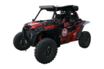 Front three-quarter view of a black and red Polaris RZR fitted with Tusk fender flares