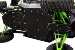 Tusk Quiet-Glide black UHMW skid plate bolted to the underside of a green Kawasaki Teryx, side view