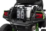 Close-up of a Tusk bed rack corner seated on a mounting pin in the UTV cargo bed