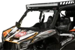 Tusk full view glass windshield on a Kawasaki KRX with a roof light bar, front view