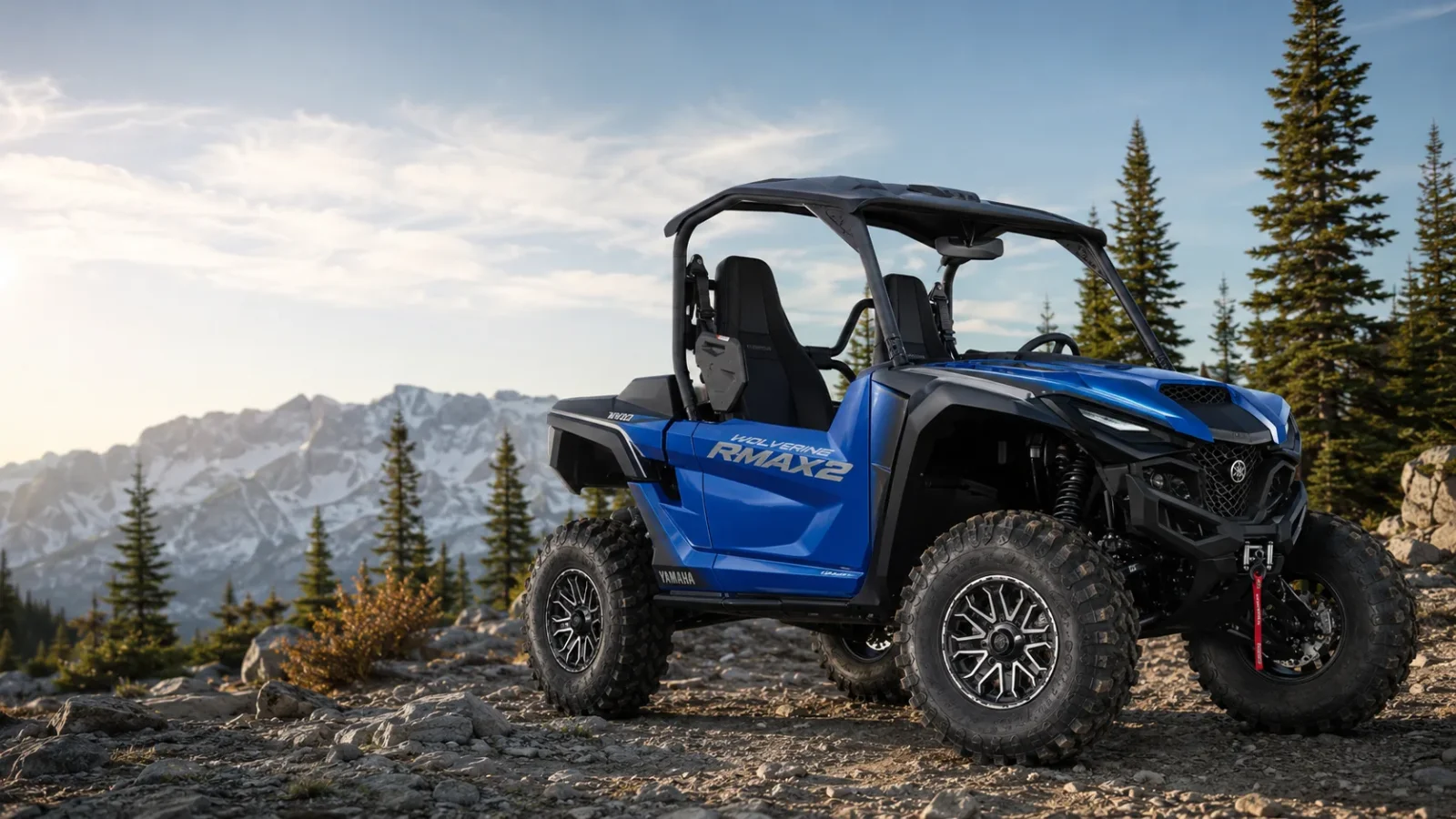 Yamaha Wolverine RMAX2 1000 in Yamaha blue on a rocky alpine mountain trail