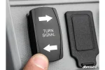 Turn signal rocker switch in a Can-Am Defender dash